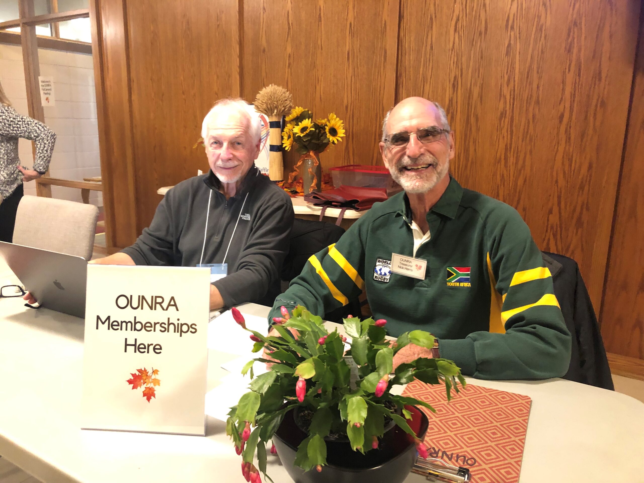 The friendly welcoming faces of executive members Rick and Nick sitting at our membership table at our Fall 2023 meeting.